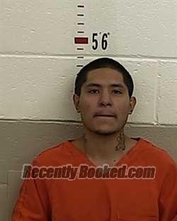 Booking photo from San Miguel County, New Mexico