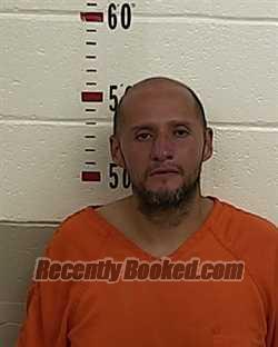 Booking photo from San Miguel County, New Mexico