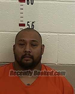 Booking photo from San Miguel County, New Mexico