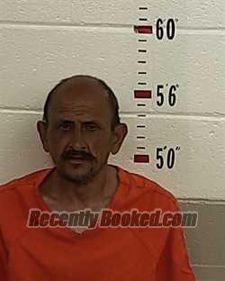 Booking photo from San Miguel County, New Mexico