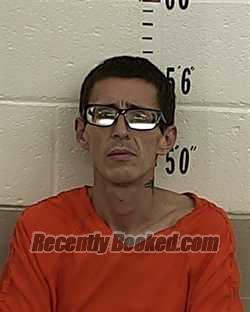Booking photo from San Miguel County, New Mexico