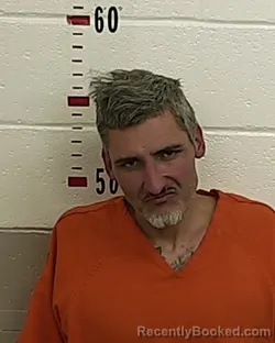 Booking photo from San Miguel County, New Mexico