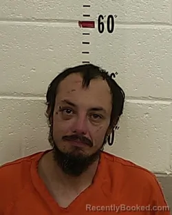 Booking photo from San Miguel County, New Mexico