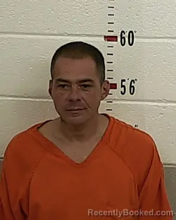 Booking photo from San Miguel County, New Mexico