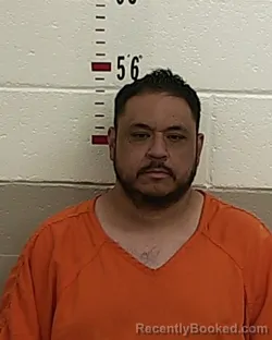 Booking photo from San Miguel County, New Mexico