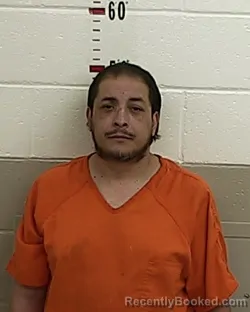 Booking photo from San Miguel County, New Mexico