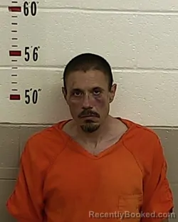 Booking photo from San Miguel County, New Mexico