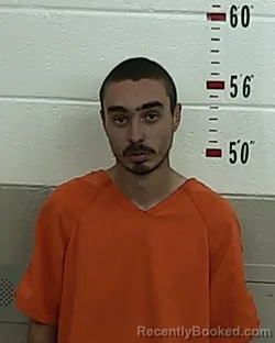 Booking photo from San Miguel County, New Mexico