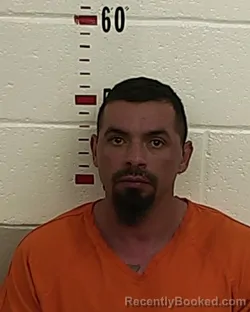 Mugshot of CHRISTOPHER RAY TAFOYA booked in San Miguel County, New Mexico on March 29, 2026