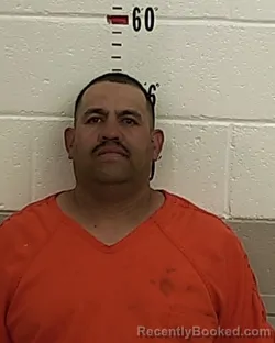 Mugshot of IVAN DOMINGUEZ booked in San Miguel County, New Mexico on July 21, 2026