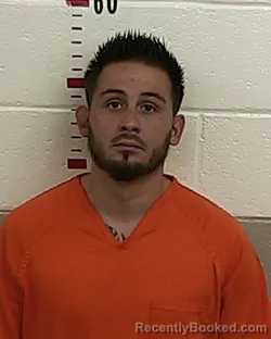 Mugshot of DAMIAN ATENCIO booked in San Miguel County, New Mexico on July 27, 2026