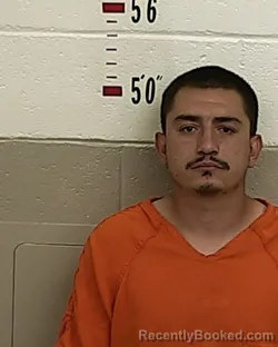 Mugshot of JOHN A GONZALES booked in San Miguel County, New Mexico on July 27, 2026