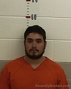 Mugshot of Isrrael Casarez-Aguirre booked in San Miguel County, New Mexico on September 30, 2026