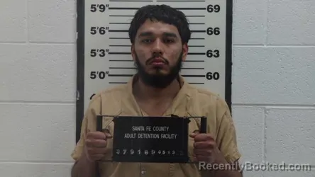 Mugshot of OMAR DANIEL MENDEZ booked in Santa Fe County, New Mexico on May 13, 2026