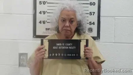 Mugshot of MARGARET CARMELLA FLORES booked in Santa Fe County, New Mexico on May 26, 2026
