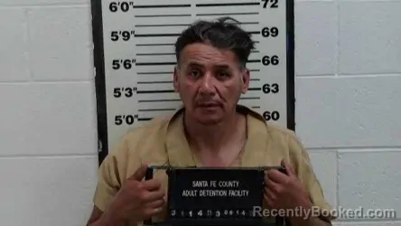 Mugshot of LORENZO GARCIA booked in Santa Fe County, New Mexico on June 14, 2026