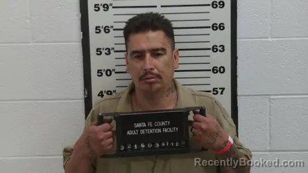 Mugshot of MIGUEL THOMAS RODRIGUEZ booked in Santa Fe County, New Mexico on July 12, 2026
