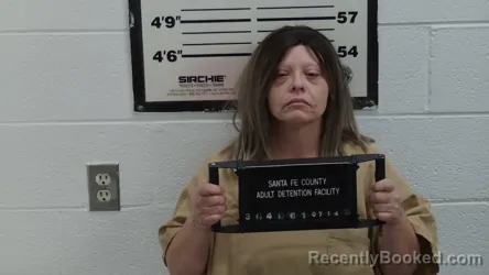 Mugshot of MONICA DEANN PENA booked in Santa Fe County, New Mexico on July 14, 2026