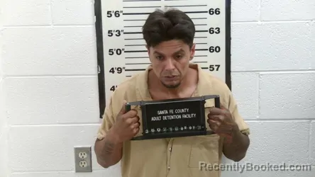 Mugshot of Julio A Mendez booked in Santa Fe County, New Mexico on August 7, 2026