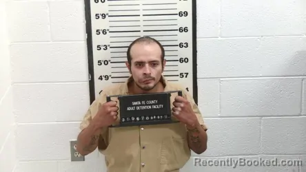 Mugshot of Juan Sebastian Lira booked in Santa Fe County, New Mexico on August 7, 2026