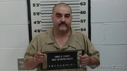 Mugshot of Eddy Pacheco booked in Santa Fe County, New Mexico on August 16, 2026