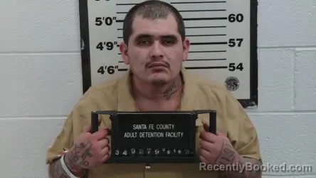 Mugshot of Manuel Ruben Candelaria booked in Santa Fe County, New Mexico on August 16, 2026