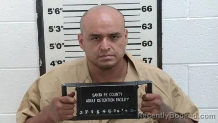 Mugshot of Michael Mena booked in Santa Fe County, New Mexico on August 17, 2026