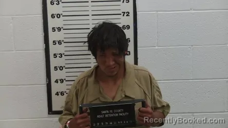 Mugshot of Merlin James Fragua booked in Santa Fe County, New Mexico on August 24, 2026