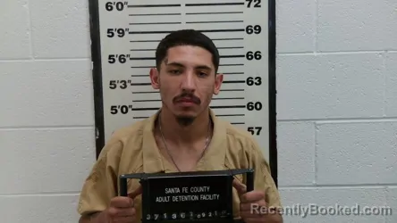 Mugshot of John Eddie Pacheco booked in Santa Fe County, New Mexico on September 22, 2026