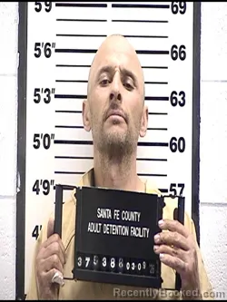 Mugshot of DOMINIC G PACK booked in Santa Fe County, New Mexico on March 9, 2026