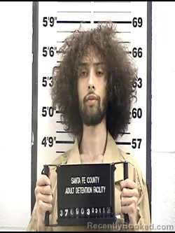 Mugshot of EVAN ANGELO MARTI booked in Santa Fe County, New Mexico on March 11, 2026