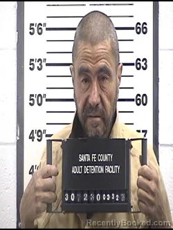 Mugshot of RAYMOND H MARTINEZ booked in Santa Fe County, New Mexico on March 22, 2026