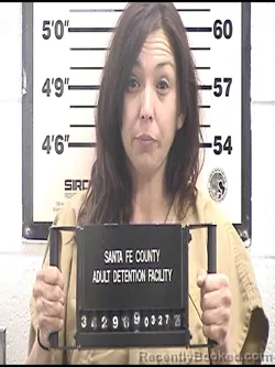 Mugshot of MICHELLE ELIZABETH GURULE booked in Santa Fe County, New Mexico on March 27, 2026