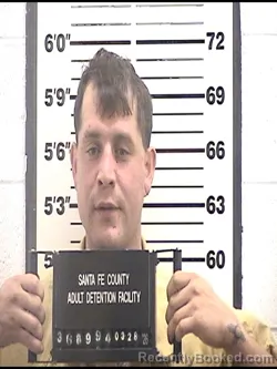 Mugshot of JUSTIN AVERY LUJAN booked in Santa Fe County, New Mexico on March 28, 2026