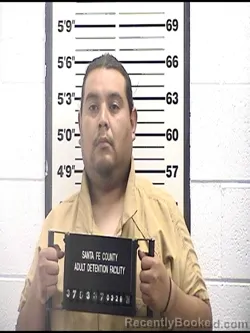 Mugshot of JONATHAN V AGUILAR booked in Santa Fe County, New Mexico on March 28, 2026