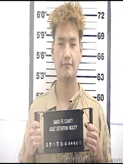 Mugshot of JUSTIN BEAREAGLE booked in Santa Fe County, New Mexico on April 1, 2026