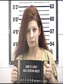 Mugshot of ASHLEIGH R BUSTOS booked in Santa Fe County, New Mexico on April 4, 2026