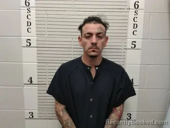 Mugshot of Joshua Sisneros booked in Socorro County, New Mexico on July 30, 2026