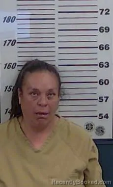 Mugshot of MONIQUE LAVENIA OLGUIN booked in Valencia County, New Mexico on March 21, 2026