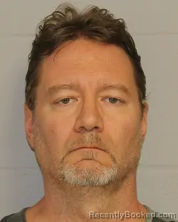 Mugshot of MICHAEL R SHARBAUGH