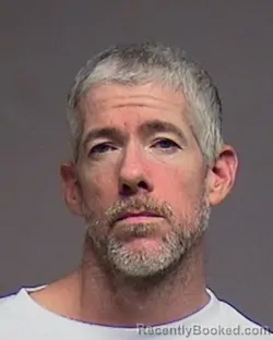 Mugshot of Adam John Riley