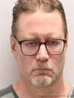 Mugshot of MICHAEL REX SHARBAUGH