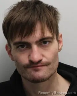 Booking photo from Chemung County, New York