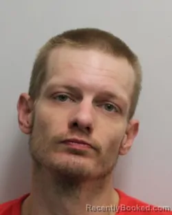 Mugshot of JUSTIN ALBERT LANGE