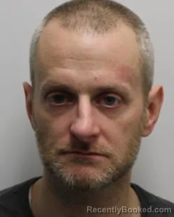 Mugshot of JUSTIN MCNEAL AIKMAN