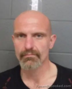 Mugshot of DANA JOHN BRITTON booked in Delaware County, New York on April 15, 2026