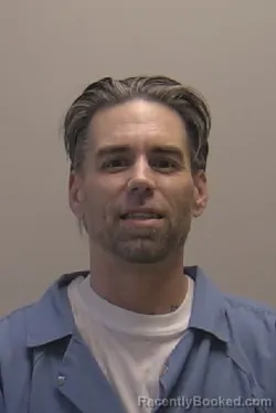 Mugshot of Thomas William Story