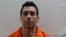 Mugshot of DE LA CRUZ REGINO JR