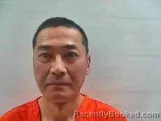 Mugshot of ZHOU GANG booked in Cameron County, Texas on March 18, 2026