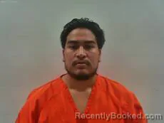 Mugshot of ABUNDIZ MATHEW booked in Cameron County, Texas on March 21, 2026